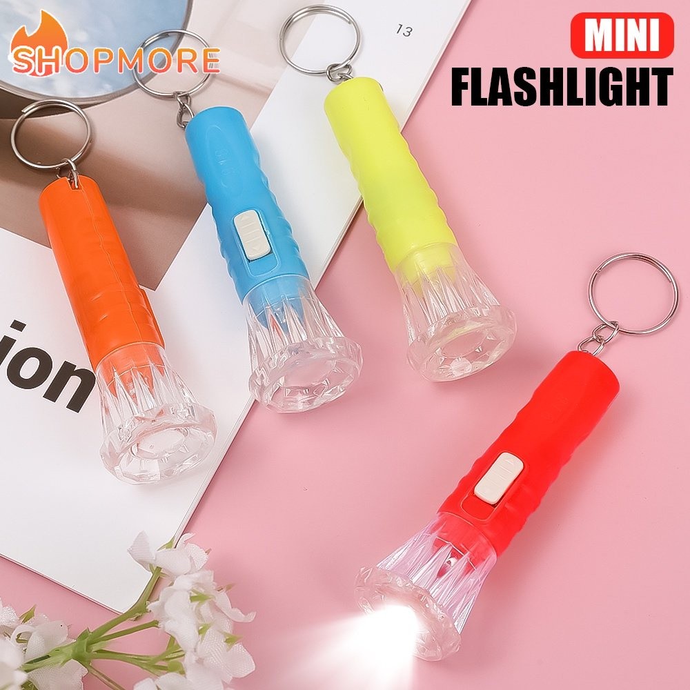 มหัศจรรย์ ที่มีสีสัน เรืองแสง ขนาดเล็ก กลางแจ้ง พวงกุญแจ ไฟฉาย แบบพกพา เดินป่า กลางแจ้ง และตั้งแคมป์ ไฟทางาน ของเล่น เรืองแสง สาหรับเด็ก